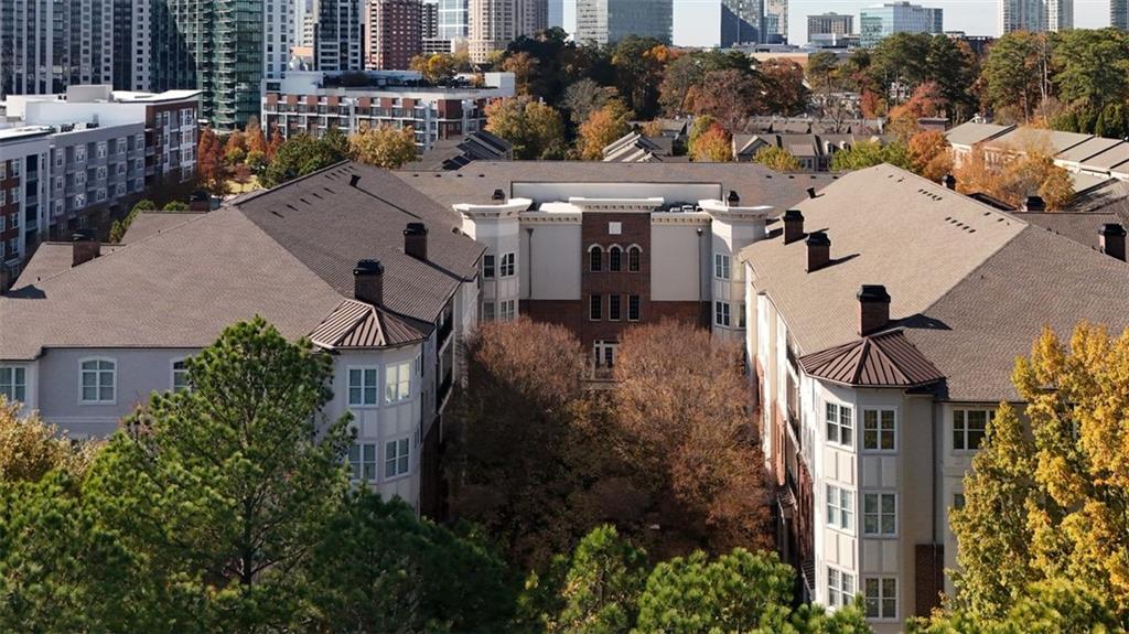 3635 East Paces Circle, Unit 1103 Atlanta, GA 30326 - Photo 37 of 37 a aerial view of a house with a garden and plants