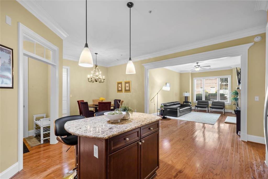 3635 East Paces Circle, Unit 1103 Atlanta, GA 30326 - Photo 8 of 37 a view of a kitchen and dining room