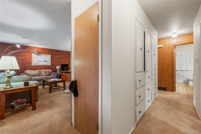 a view of a hallway with workspace