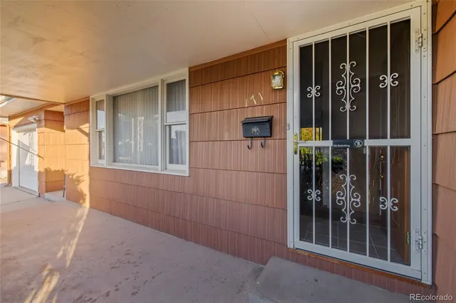 a view of a house with a glass door