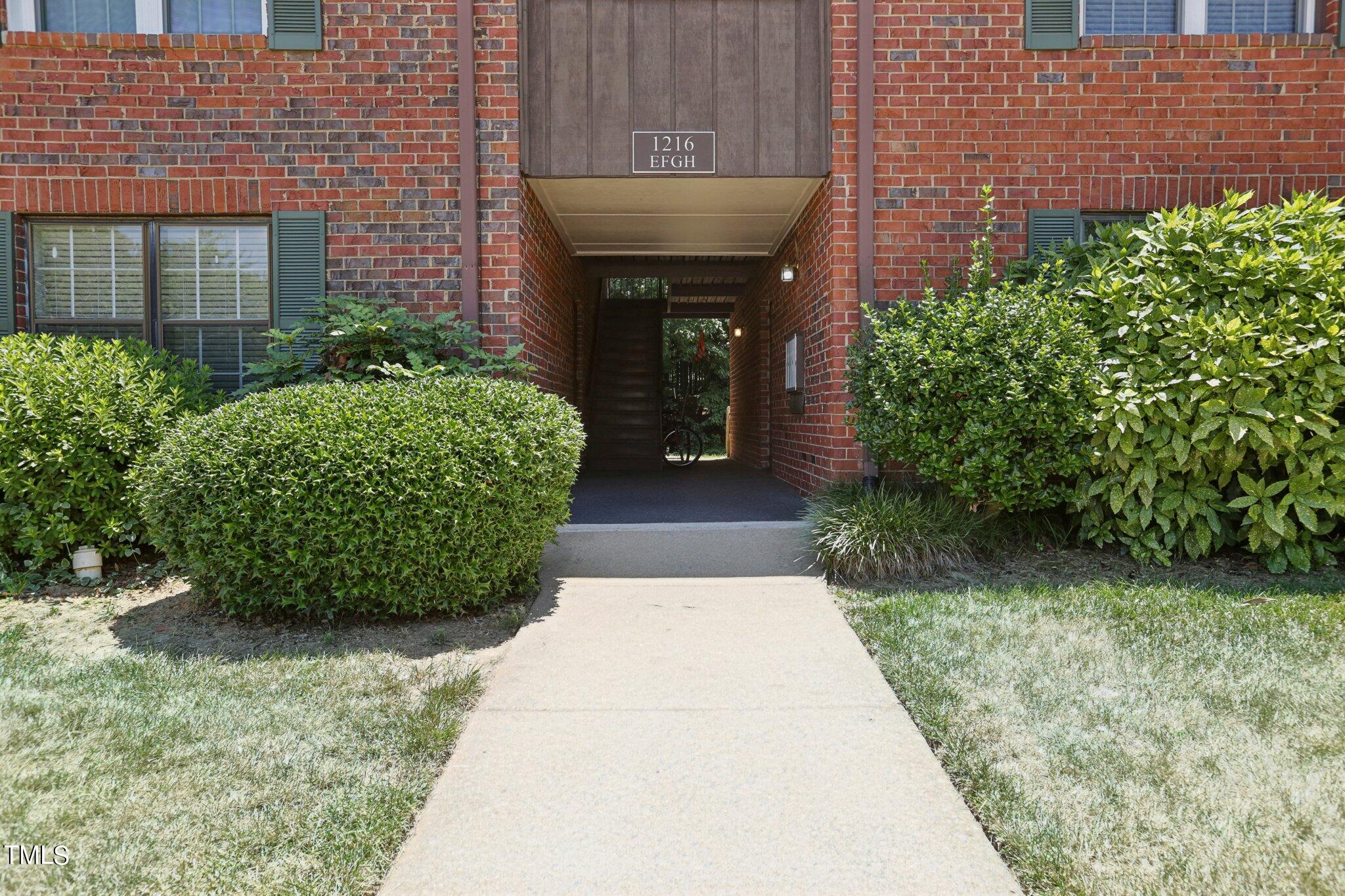 1216 Manassas Court, Unit E Raleigh, NC 27609 - Photo 3 of 20 a view of a entryway in front of house