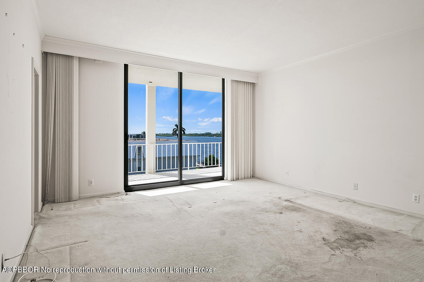 2150 Ibis Isle Road, Unit 17 Palm Beach, FL 33480 - Photo 16 of 55 a view of an empty room with glass door