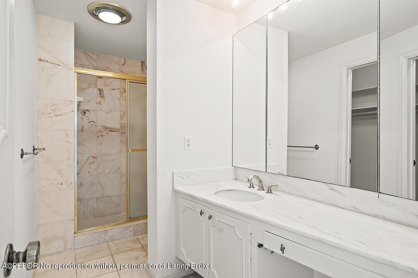 2150 Ibis Isle Road, Unit 17 Palm Beach, FL 33480 - Photo 19 of 55 a bathroom with a granite countertop sink mirror and shower