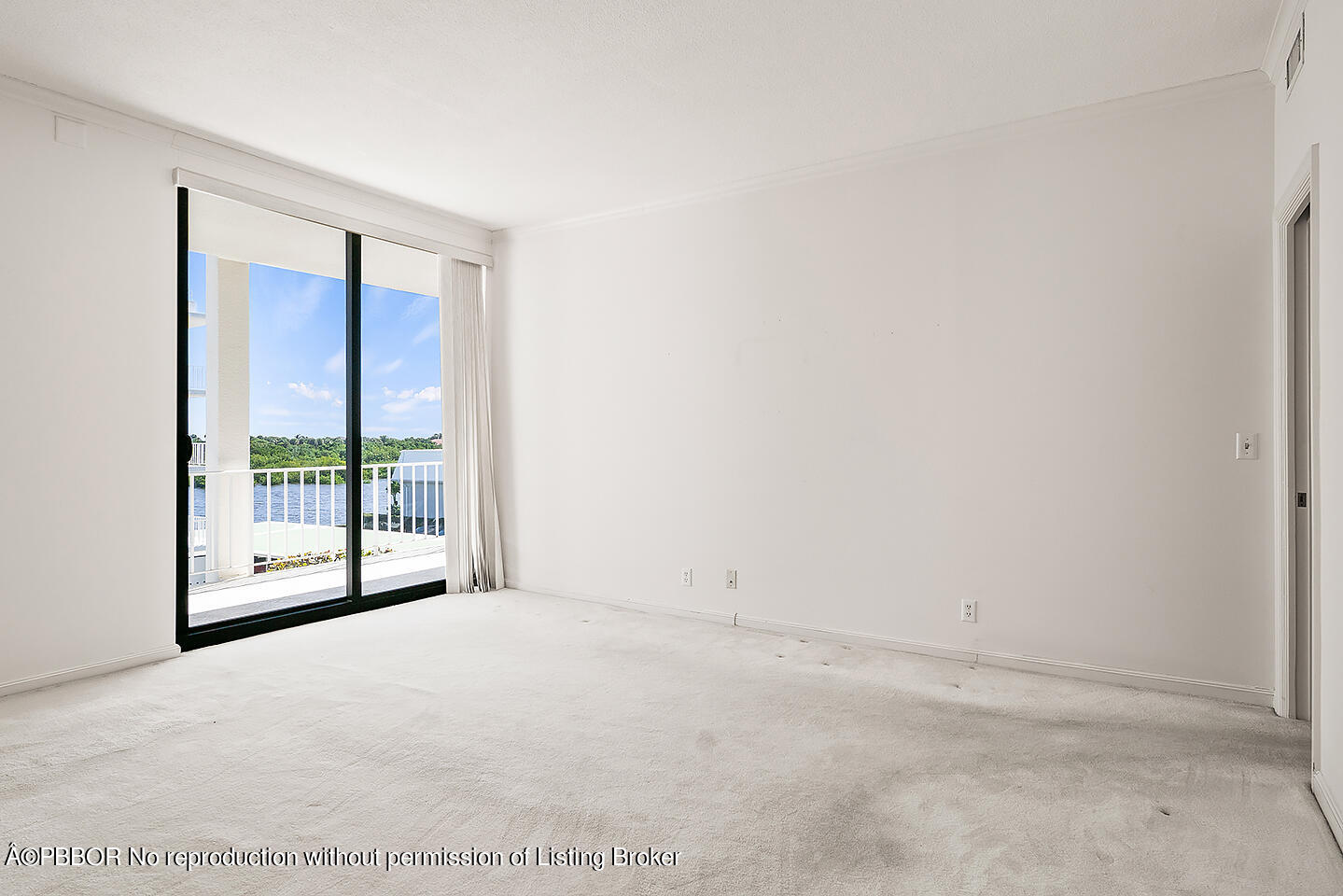 2150 Ibis Isle Road, Unit 17 Palm Beach, FL 33480 - Photo 21 of 55 a view of a big room with windows and a bathroom