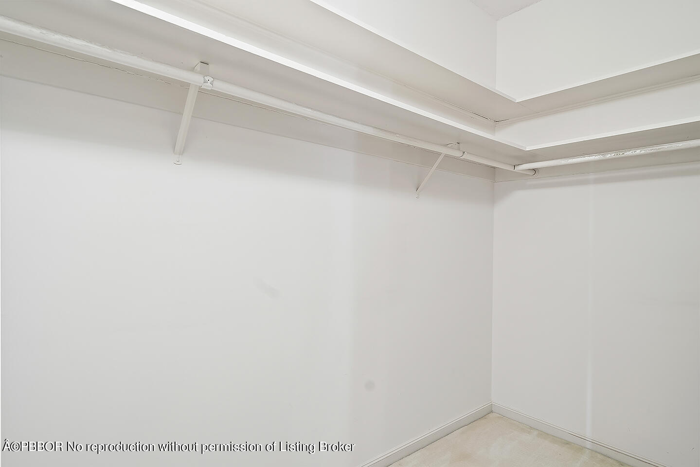 2150 Ibis Isle Road, Unit 17 Palm Beach, FL 33480 - Photo 32 of 55 a view of an empty walk in closet