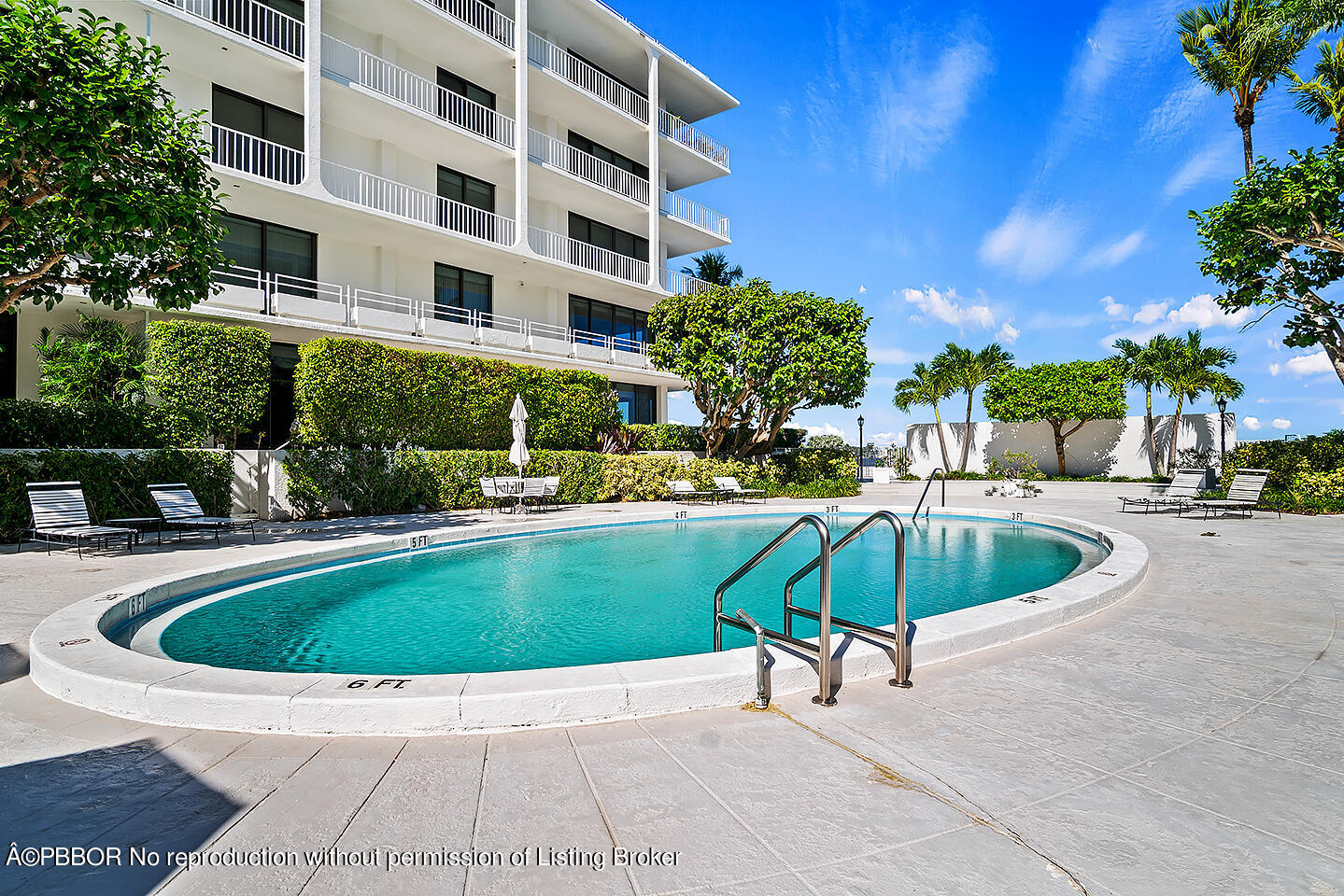 2150 Ibis Isle Road, Unit 17 Palm Beach, FL 33480 - Photo 37 of 55 a view of a swimming pool with a patio