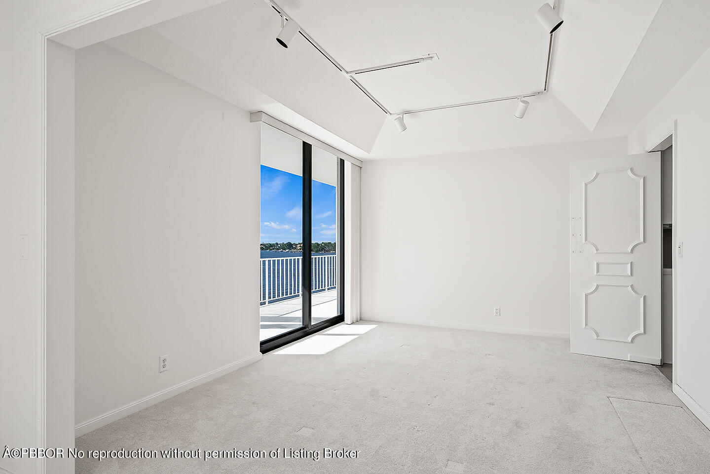 2150 Ibis Isle Road, Unit 17 Palm Beach, FL 33480 - Photo 9 of 55 a view of an empty room with a window