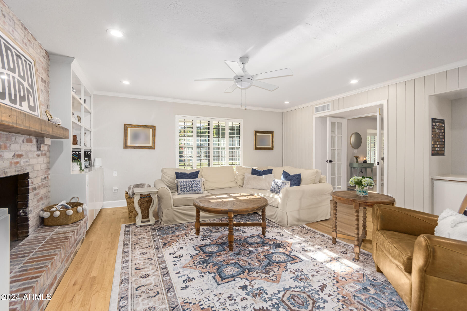 744 West Royal Palm Road Phoenix, AZ 85021 - Photo 13 of 65 a living room with furniture and a fireplace