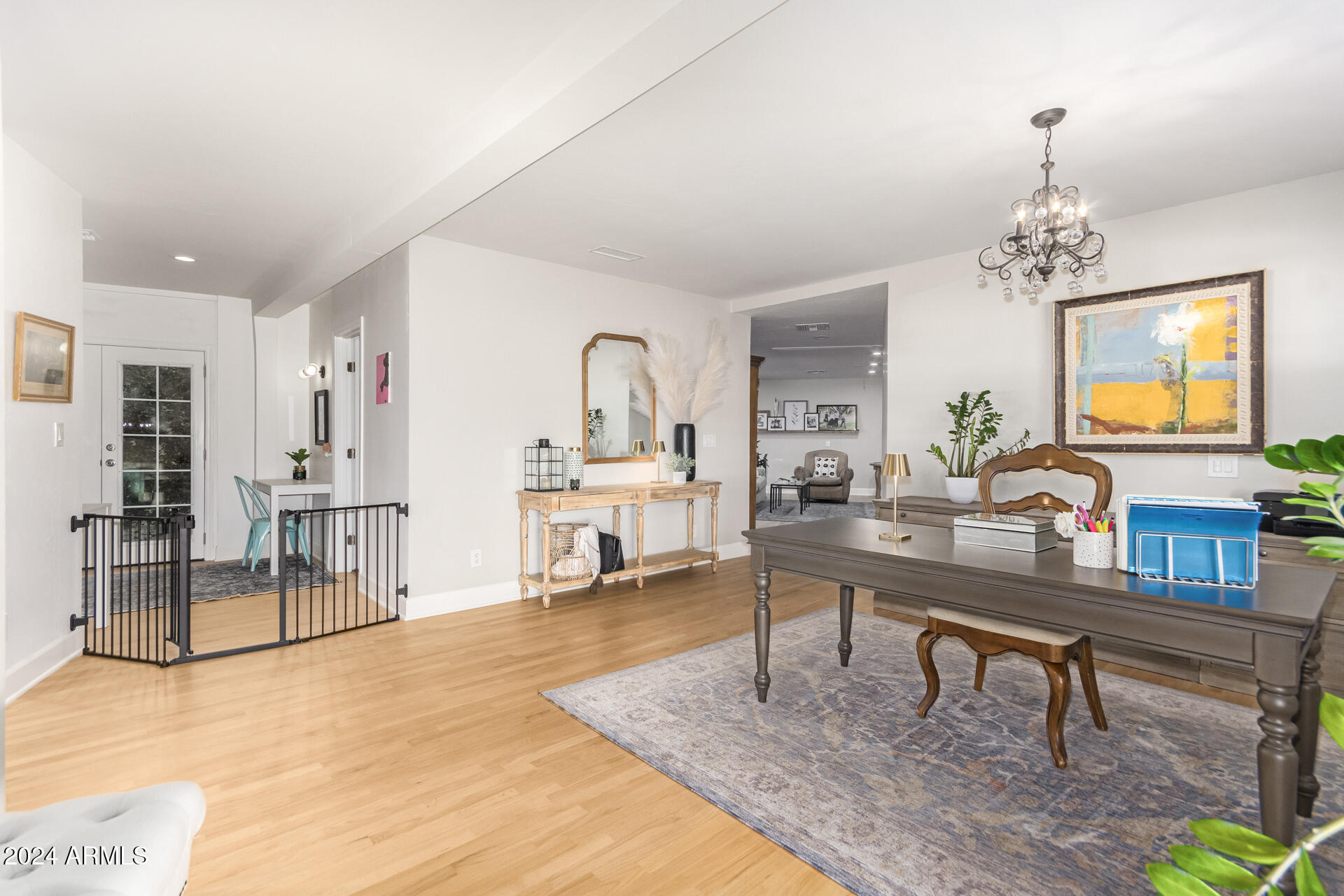 744 West Royal Palm Road Phoenix, AZ 85021 - Photo 23 of 65 a living room with furniture and a dining table