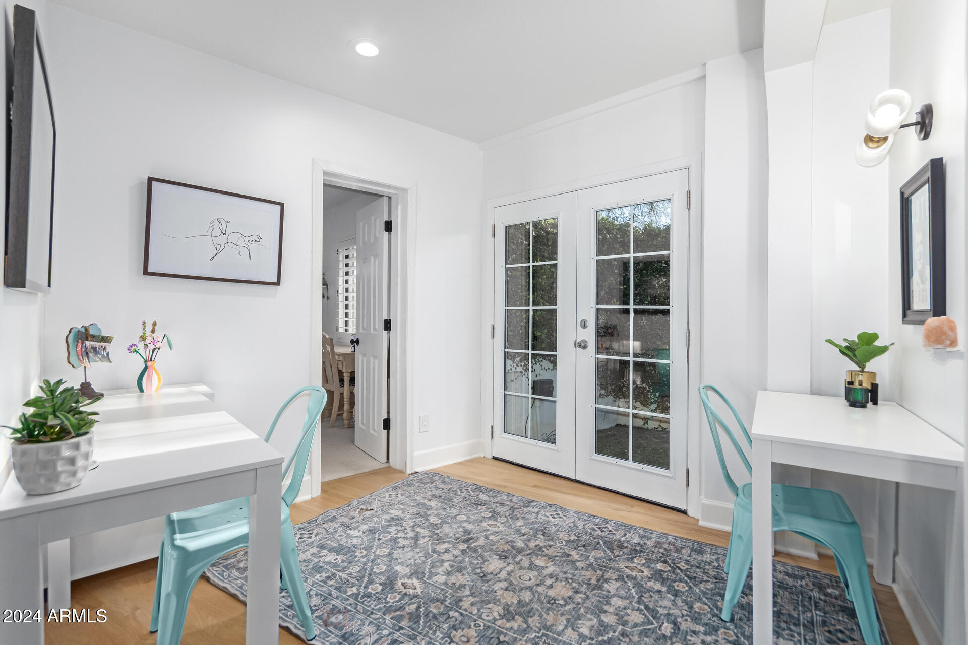 744 West Royal Palm Road Phoenix, AZ 85021 - Photo 24 of 65 a living room with furniture and a potted plant