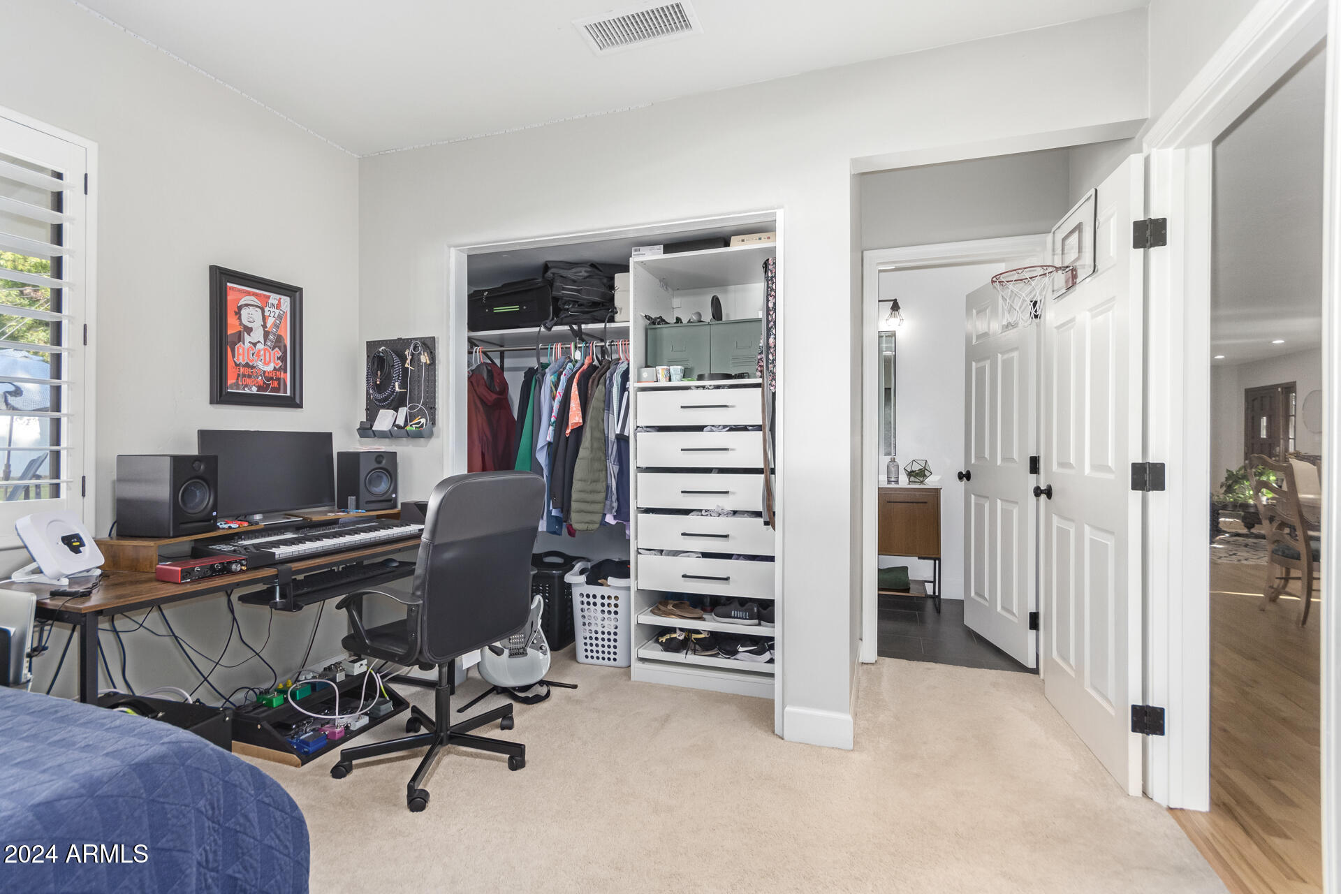 744 West Royal Palm Road Phoenix, AZ 85021 - Photo 30 of 65 a view of a workspace with furniture and a window