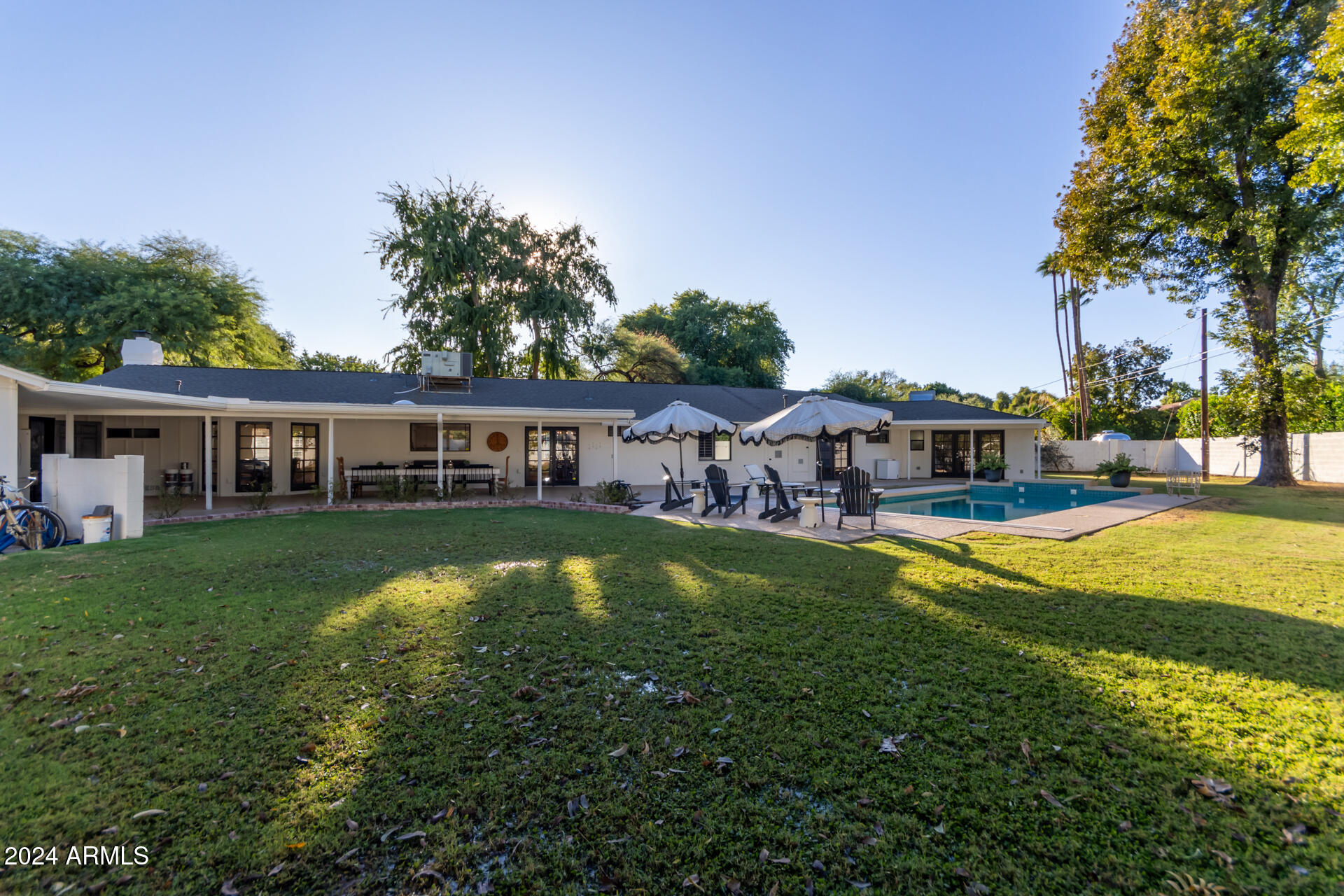 744 West Royal Palm Road Phoenix, AZ 85021 - Photo 33 of 65 a view of house with swimming pool yard and outdoor seating