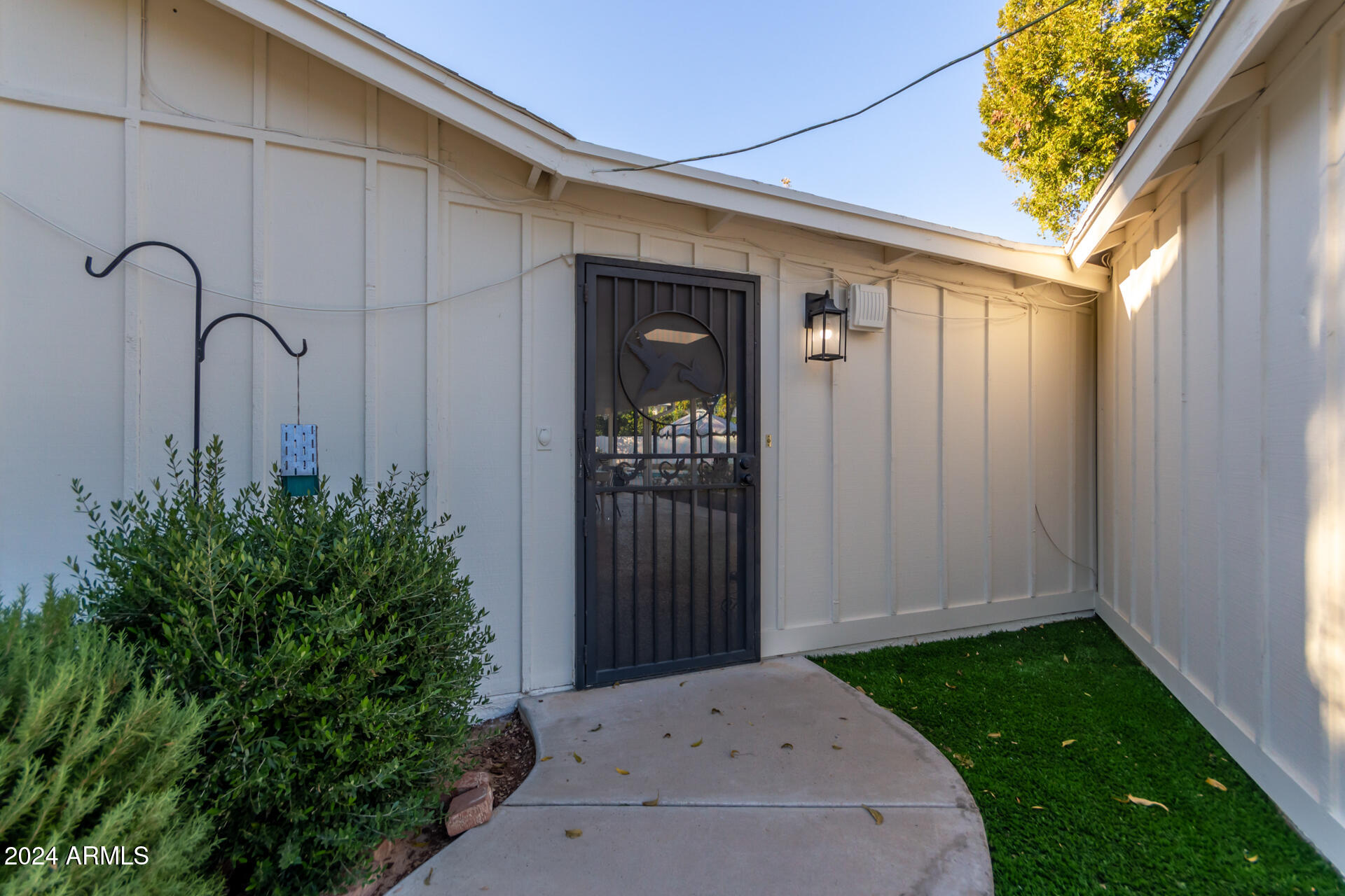 744 West Royal Palm Road Phoenix, AZ 85021 - Photo 65 of 65 a front view of a house with garden