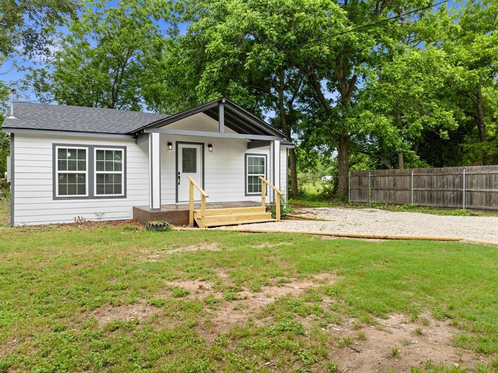 3313 South 3rd Street Waco, TX 76706 - Photo 26 of 28 a view of a house with a backyard