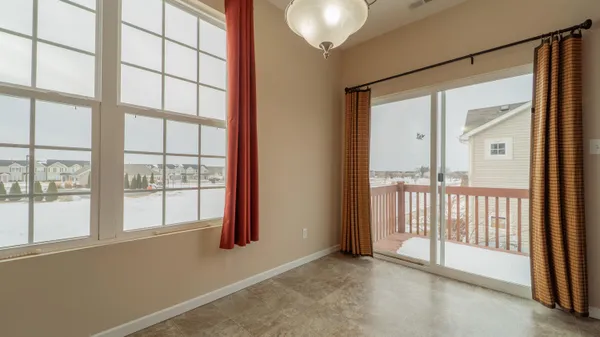 a view of a room with a large window