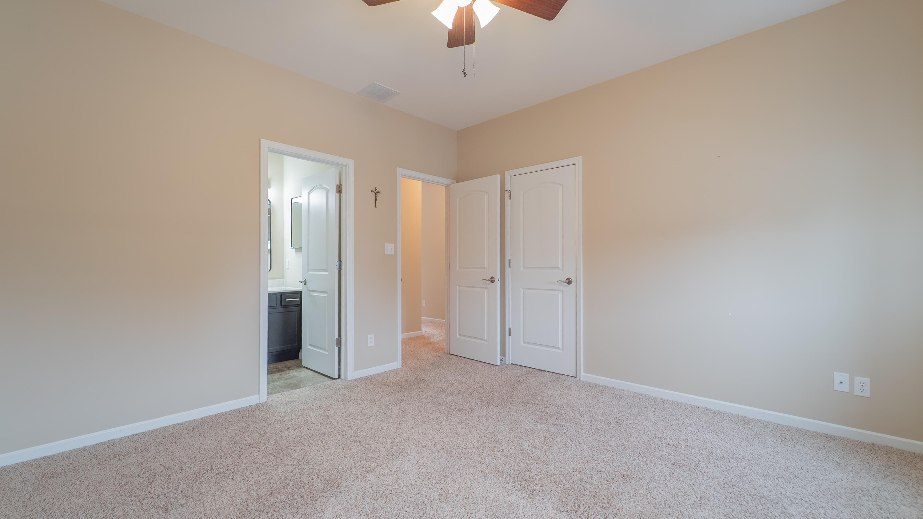 11530 Vermont Court Crown Point, IN 46307 - Photo 16 of 27 a view of empty room with a ceiling fan