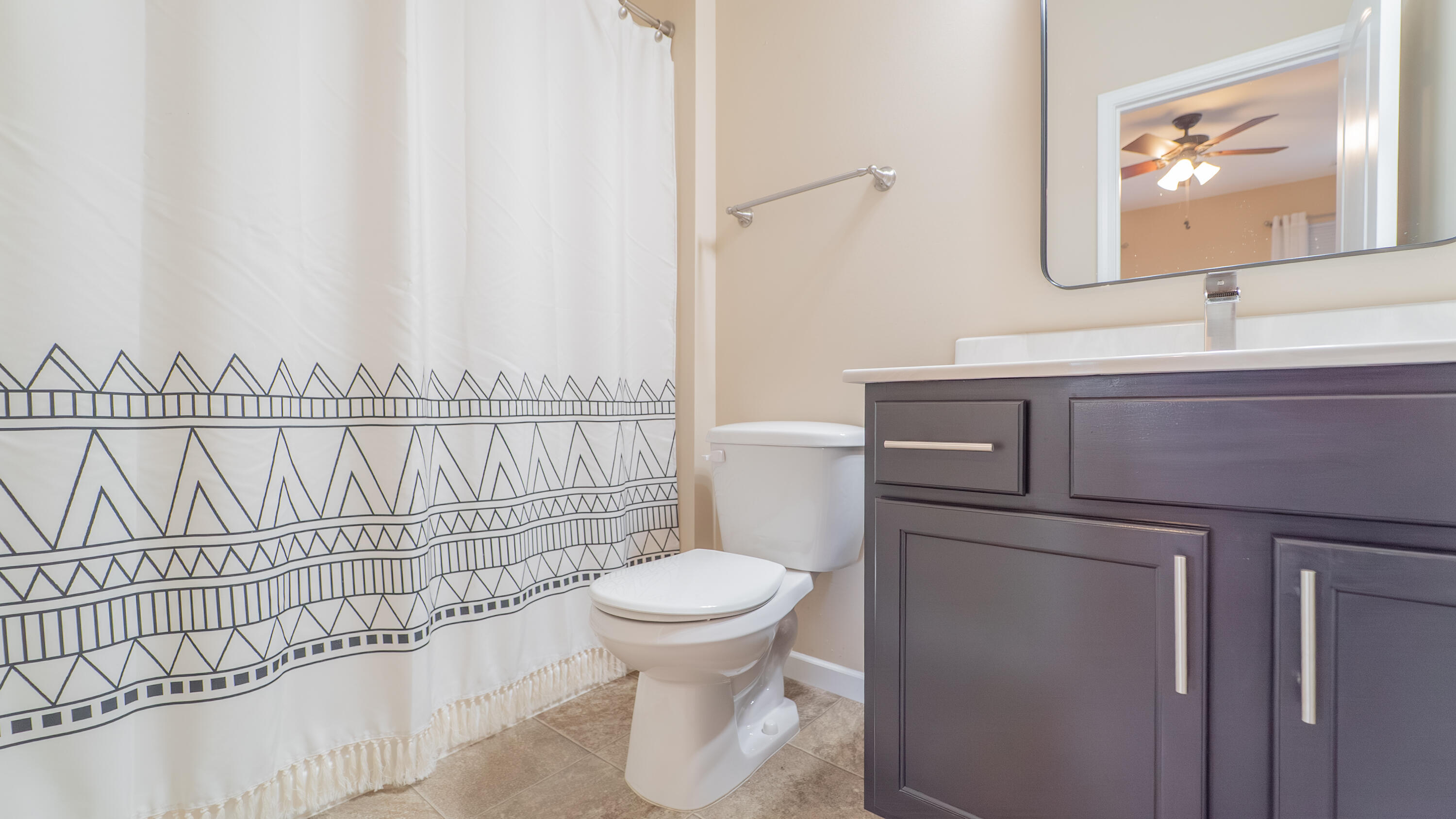 11530 Vermont Court Crown Point, IN 46307 - Photo 18 of 27 a bathroom with a toilet and a sink