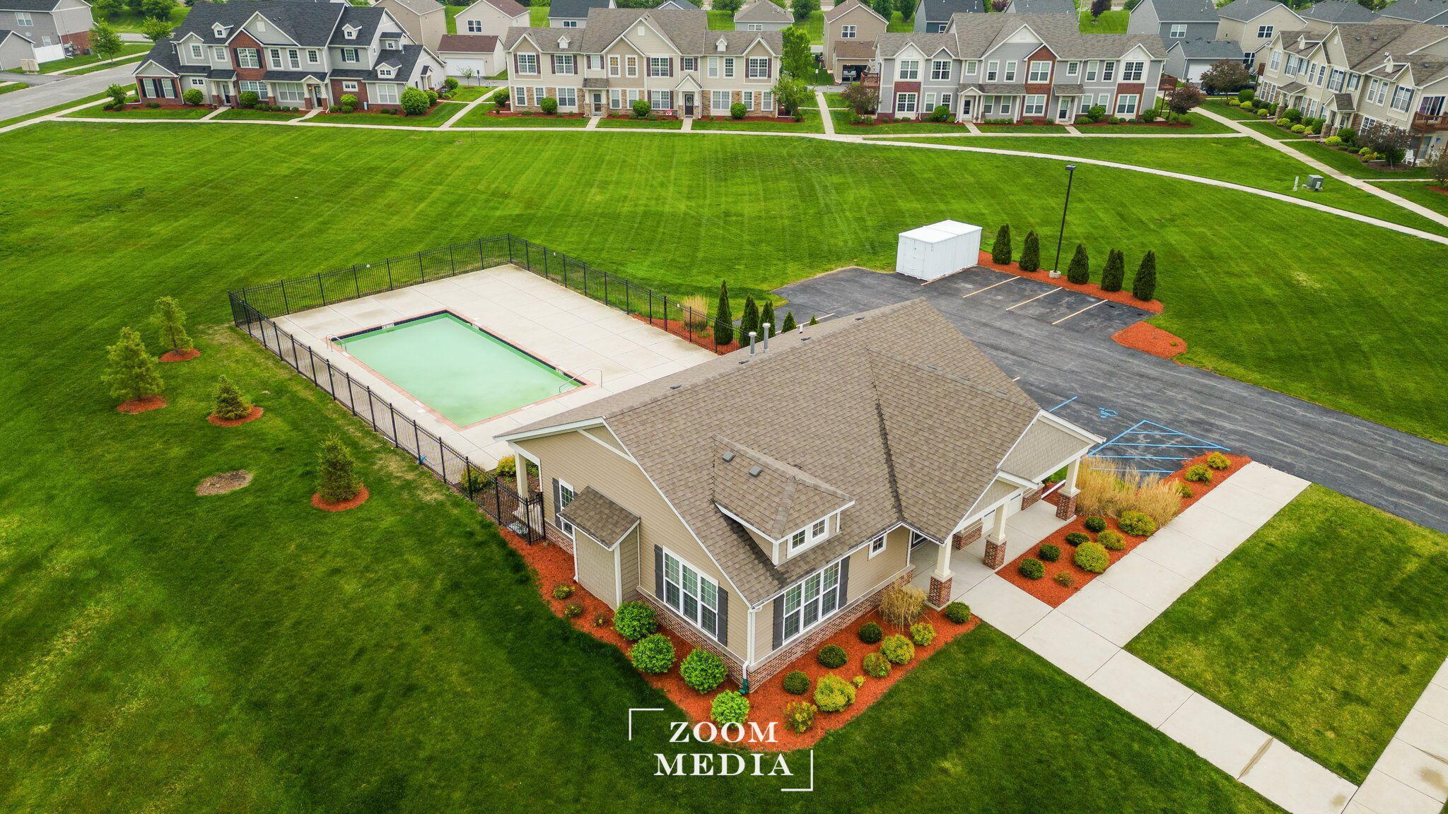 11530 Vermont Court Crown Point, IN 46307 - Photo 4 of 27 an aerial view of a house with swimming pool garden and trees