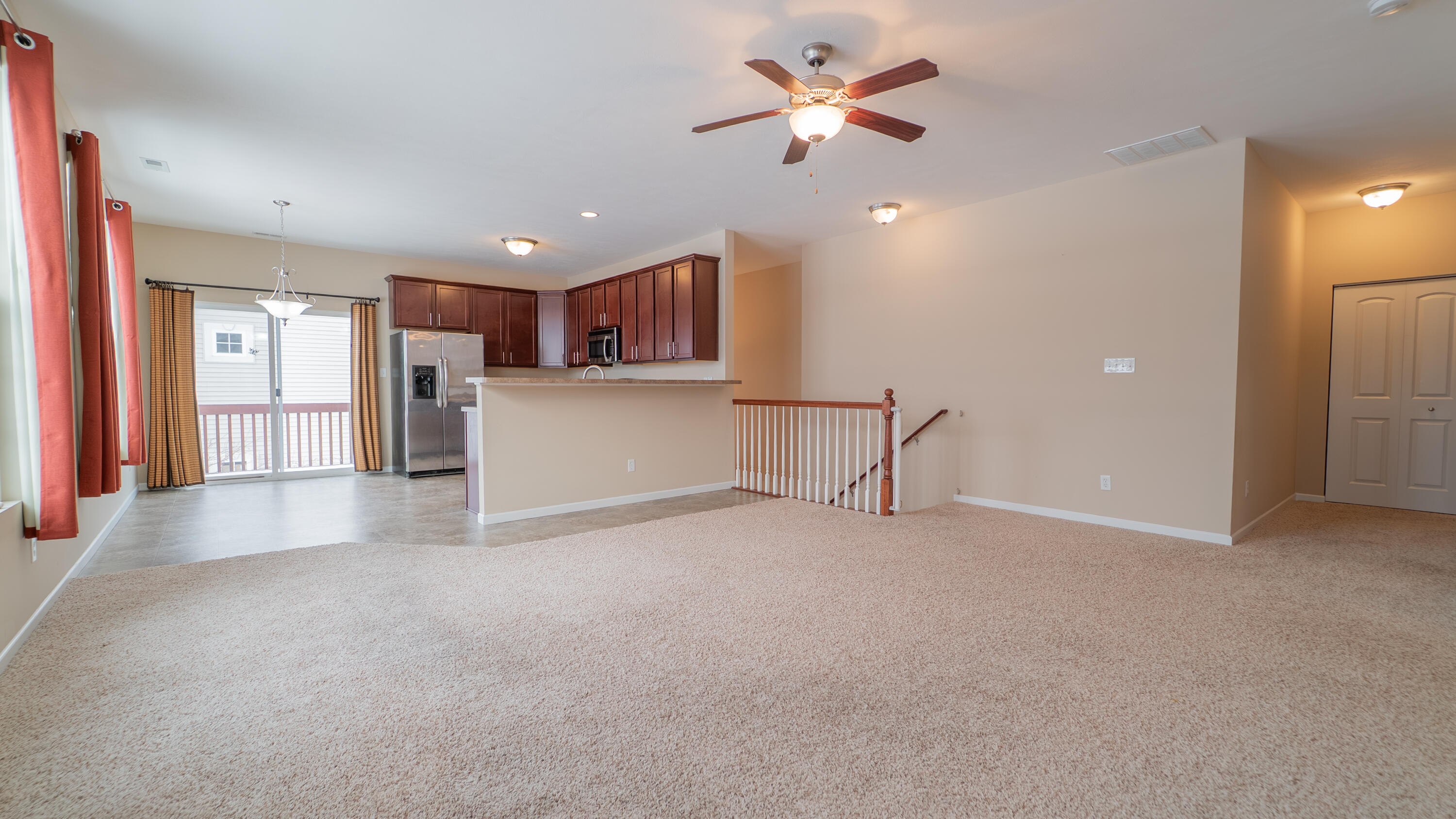 11530 Vermont Court Crown Point, IN 46307 - Photo 5 of 27 a view of a kitchen with a sink and a refrigerator cabinets