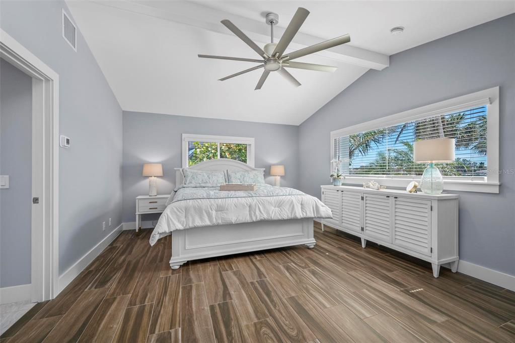 75 Spyglass Alley Placida, FL 33946 - Photo 23 of 79 a bedroom with a bed and a window