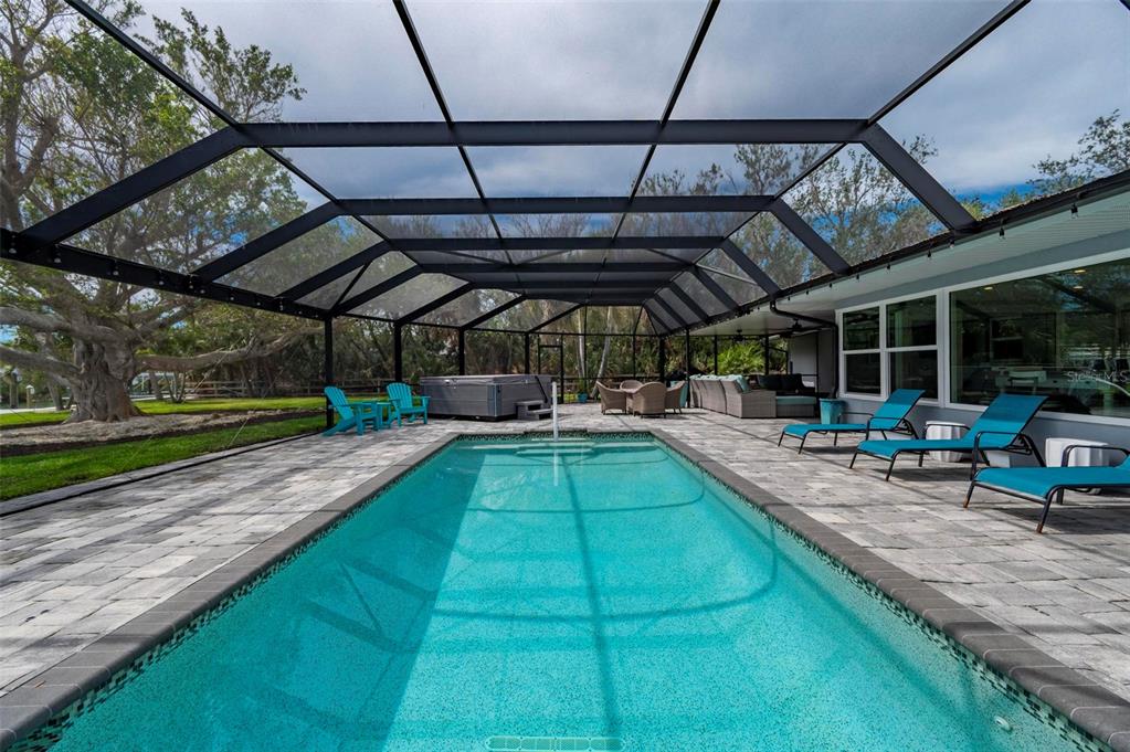 75 Spyglass Alley Placida, FL 33946 - Photo 48 of 79 a view of a backyard with a patio and a patio