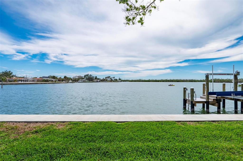 75 Spyglass Alley Placida, FL 33946 - Photo 58 of 79 a view of a lake with outdoor space