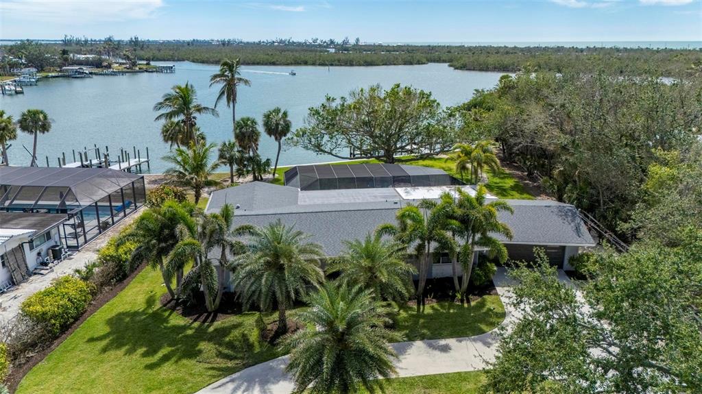 75 Spyglass Alley Placida, FL 33946 - Photo 66 of 79 a aerial view of a house with a lake view