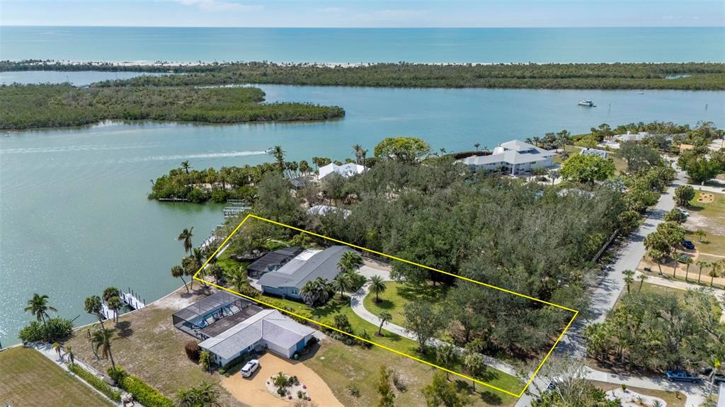 75 Spyglass Alley Placida, FL 33946 - Photo 69 of 79 an aerial view of a house with a lake view