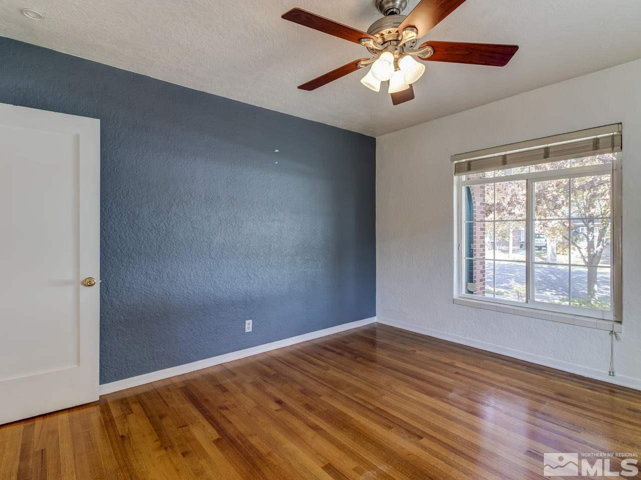 950 Walker Avenue Reno, NV 89509 - Photo 13 of 25 a view of empty room with wooden floor and fan