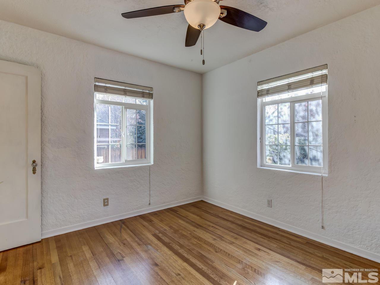 950 Walker Avenue Reno, NV 89509 - Photo 14 of 25 a view of empty room with wooden floor and fan