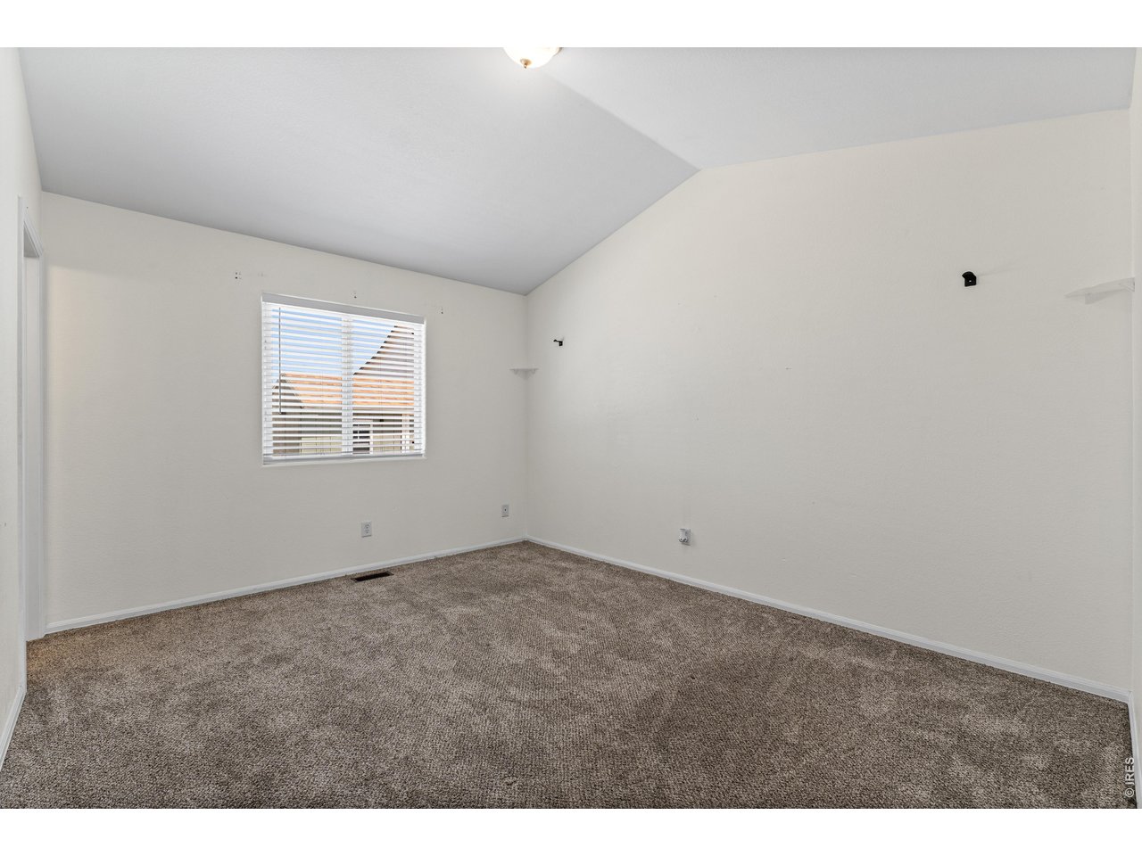 309 East 29th St Road Greeley, CO 80631 - Photo 17 of 31 Primary bedroom from hallway