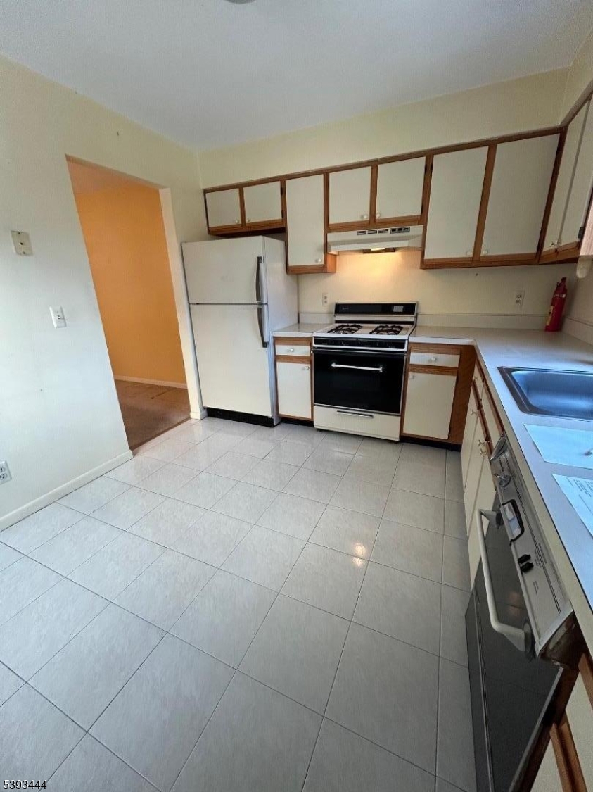 43 Rhea Run Newton, NJ 07860 - Photo 5 of 11 a kitchen with a sink and a stove top oven