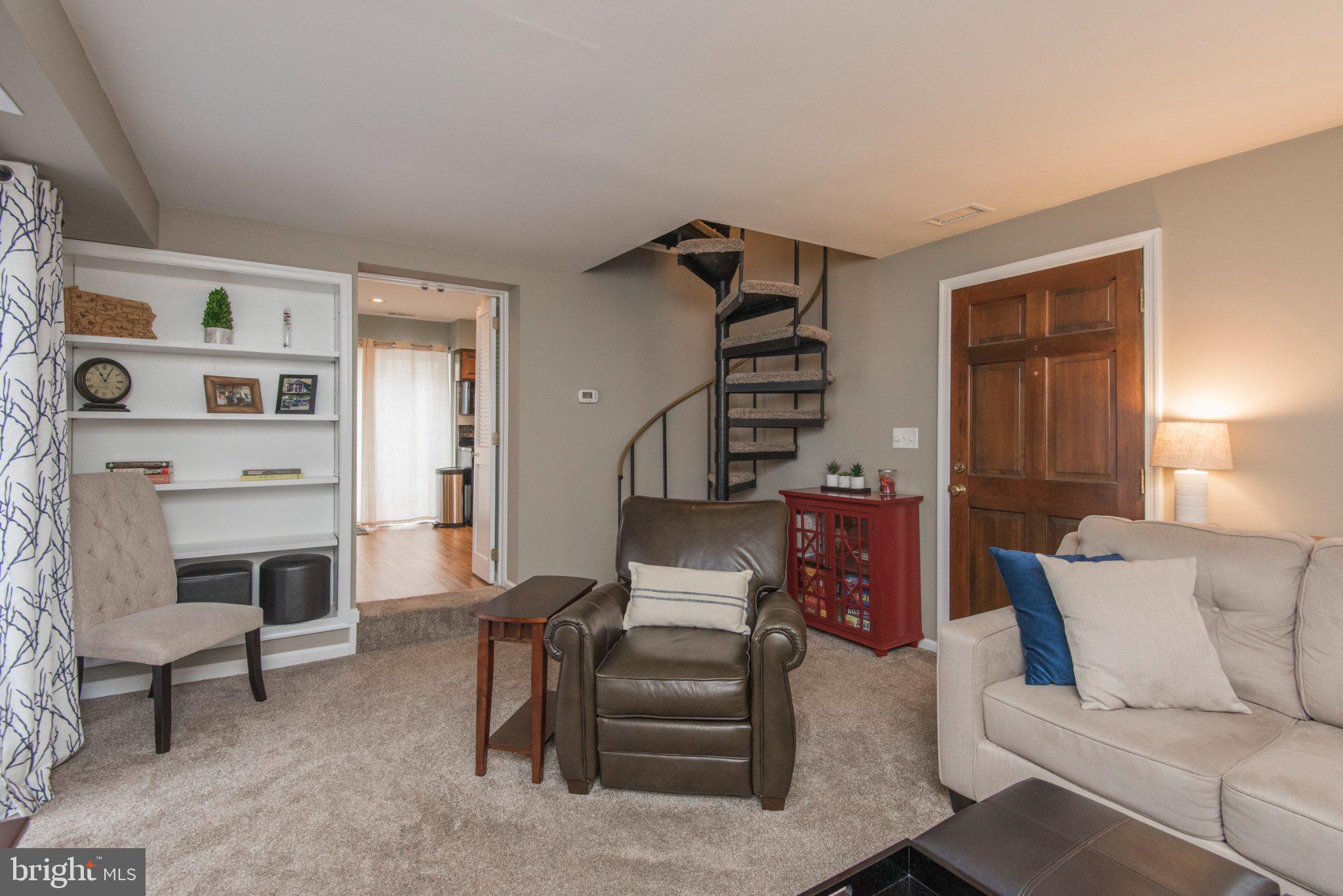 650 North Valley Forge Road Devon, PA 19333 - Photo 6 of 38 Cozy living space with spiral staircase.