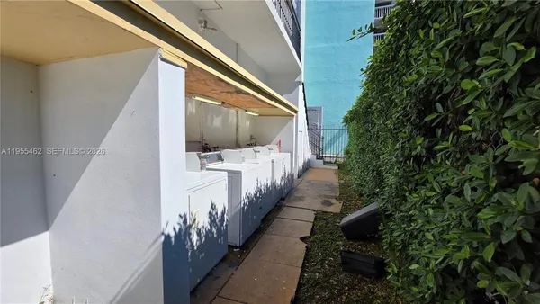 a view of a backyard of the house