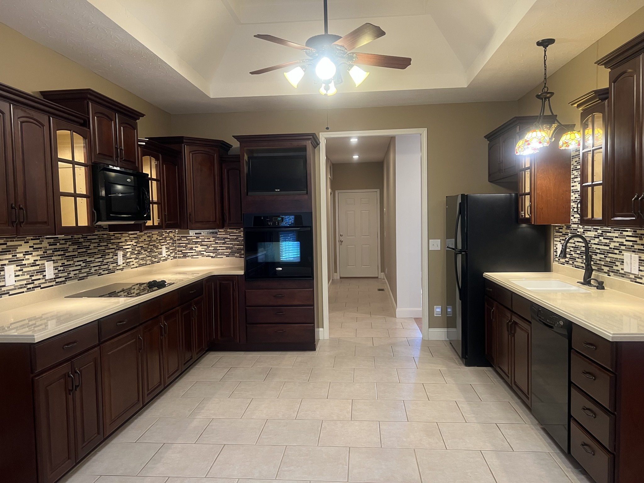 195 Froedge Drive Lafayette, TN 37083 - Photo 11 of 29 a large kitchen with a sink and stainless steel appliances