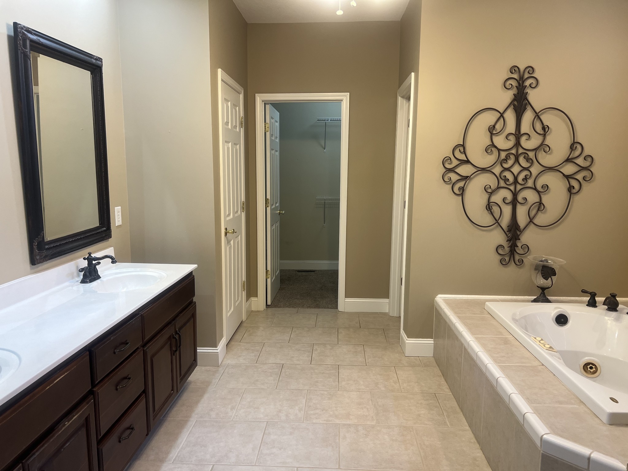 195 Froedge Drive Lafayette, TN 37083 - Photo 15 of 29 a spacious bathroom with a tub sink and mirror