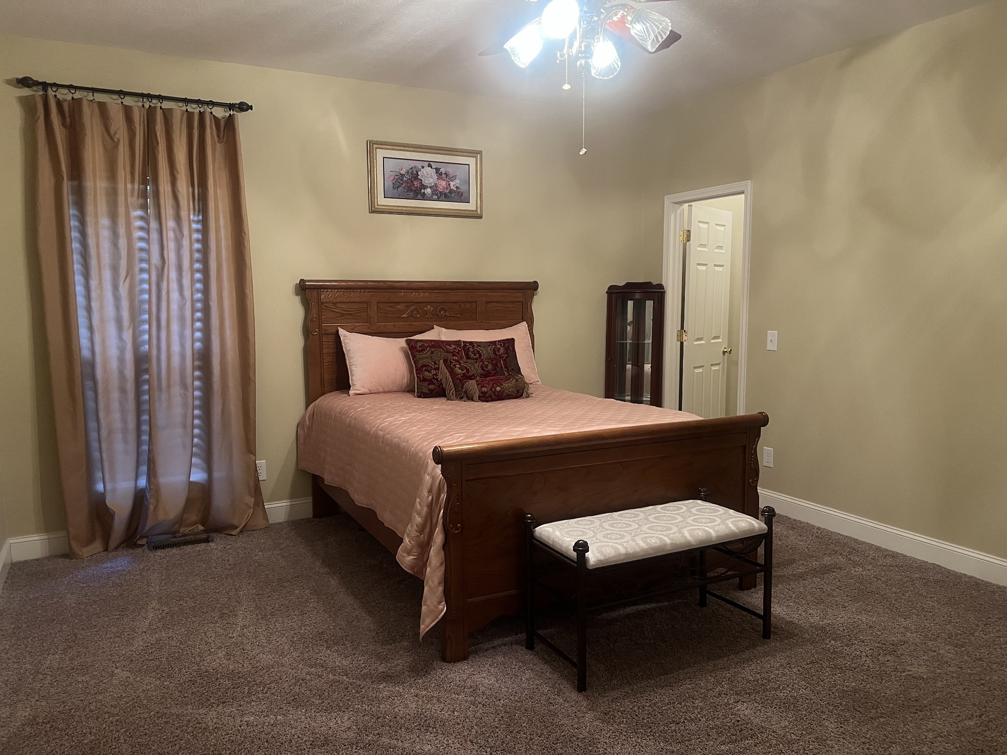195 Froedge Drive Lafayette, TN 37083 - Photo 23 of 29 a bed sitting in a bedroom next to a window