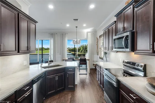 $949,000 | 8783 Coastline Court, Unit 202, Naples, FL 34120