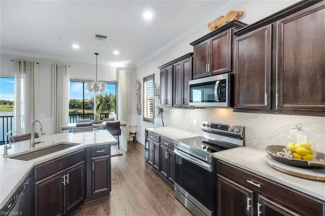 $949,000 | 8783 Coastline Court, Unit 202, Naples, FL 34120