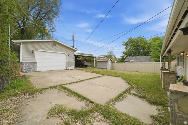 977 23rd Street Ogden, UT 84401 - Photo 29 of 29 Garage featuring a shed and a garage