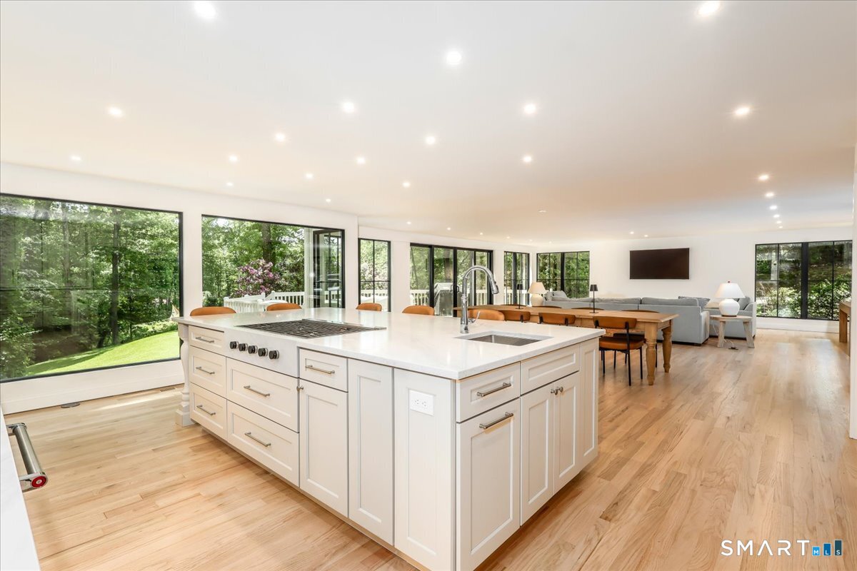 256 Wilton Road East Ridgefield, CT 06877 - Photo 7 of 40 a kitchen with a stove and a large window