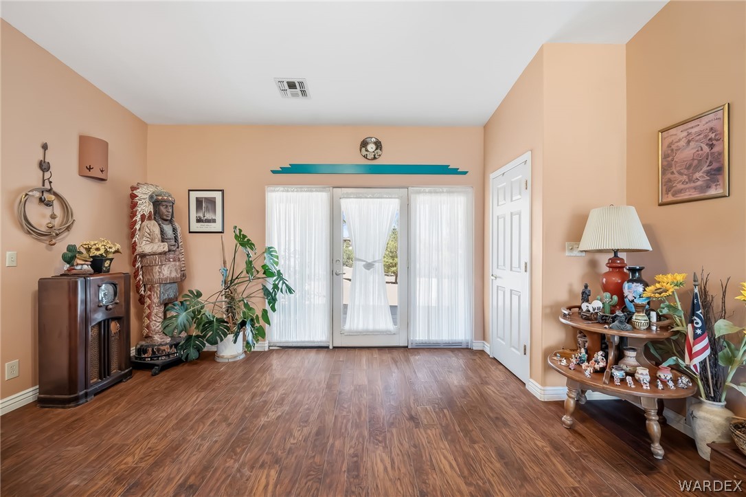 2401 North Stephan Road Kingman, AZ 86401 - Photo 23 of 92 a view of a room with furniture and hardwood floor