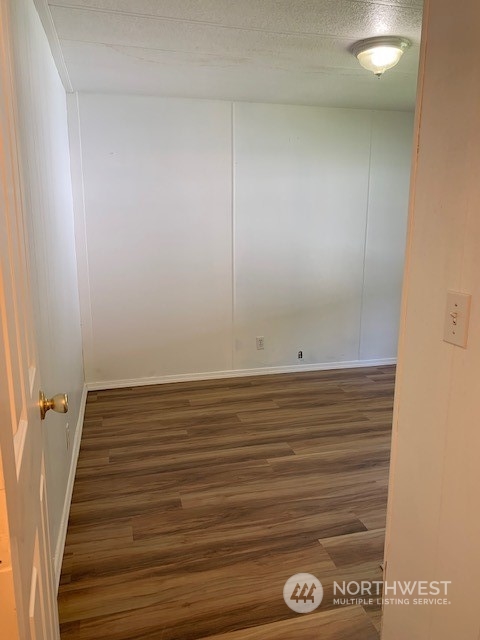 6800 North Enterprise Road, Unit 24 Ferndale, WA 98248 - Photo 13 of 18 a view of wooden floor
