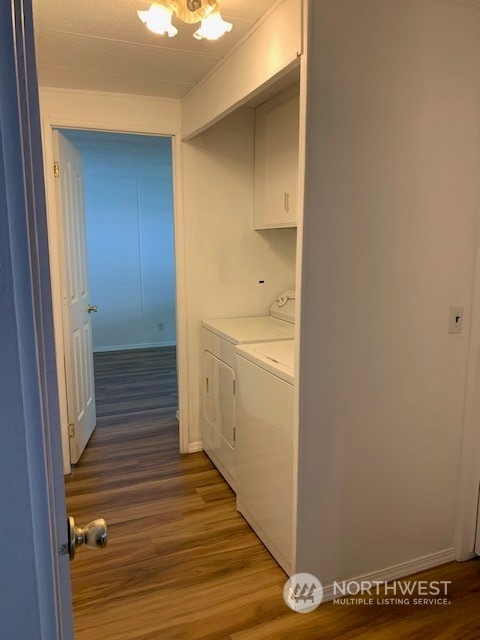 6800 North Enterprise Road, Unit 24 Ferndale, WA 98248 - Photo 8 of 18 a view of a hallway with wooden floor and entryway