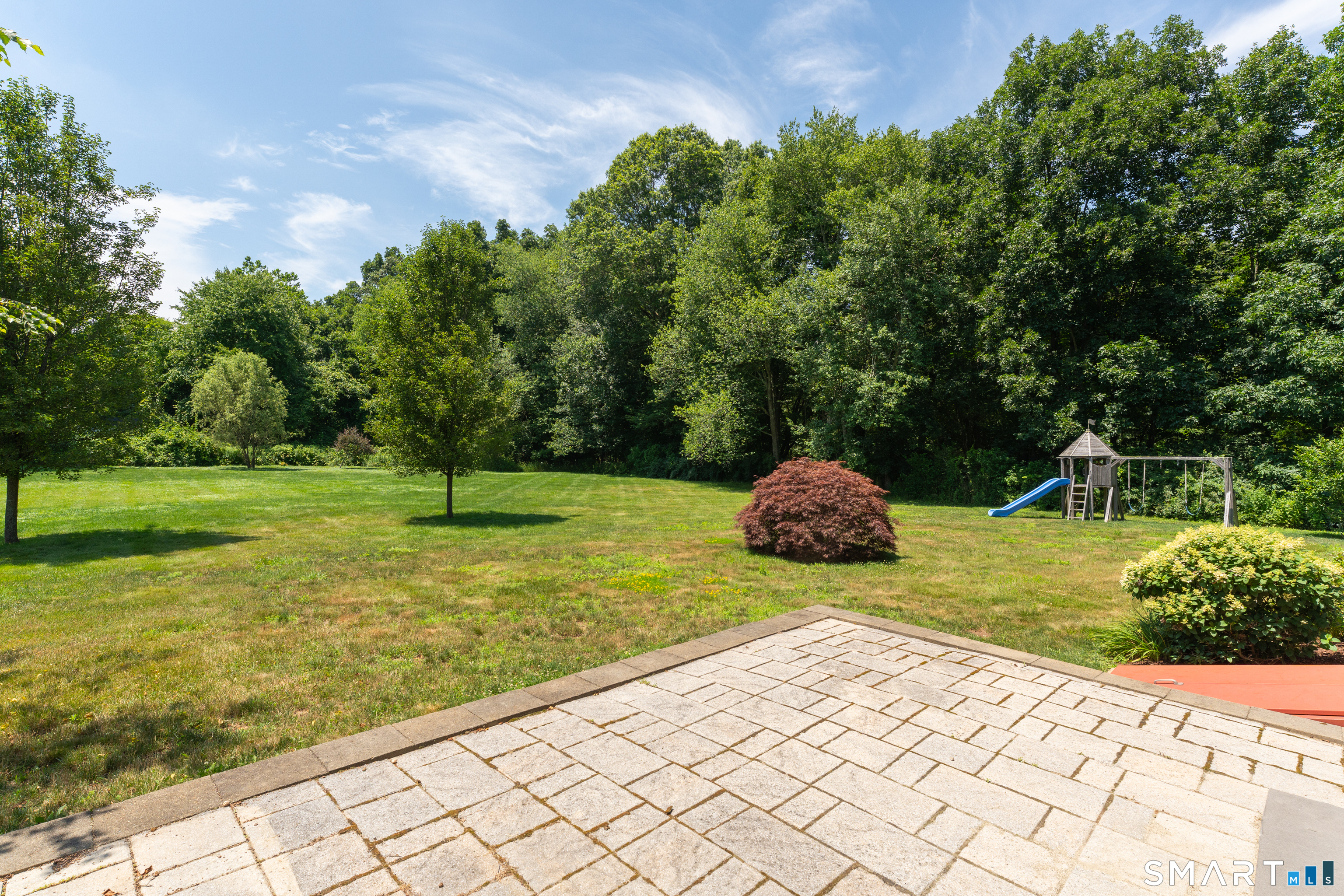838 Little Meadow Road Guilford, CT 06437 - Photo 32 of 40 Patio and view of the swingset