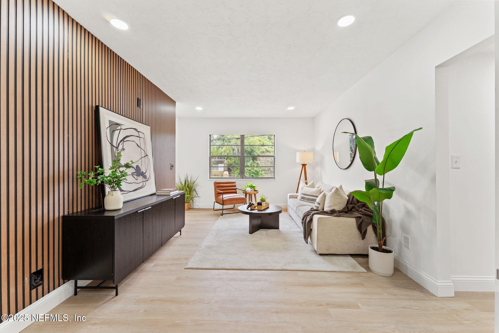 1436 Forest Hills Road Jacksonville, FL 32208 - Photo 13 of 27 a living room with furniture