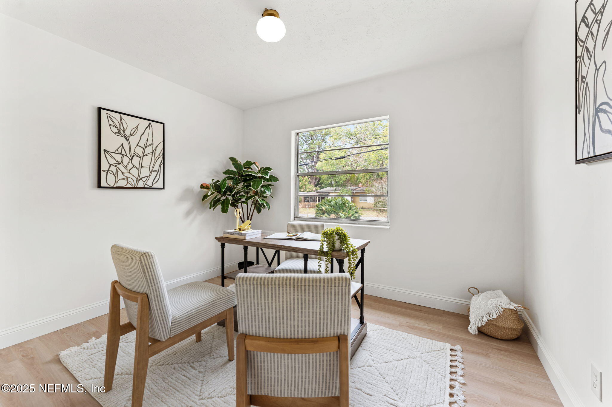 1436 Forest Hills Road Jacksonville, FL 32208 - Photo 21 of 27 a living room with furniture and a window