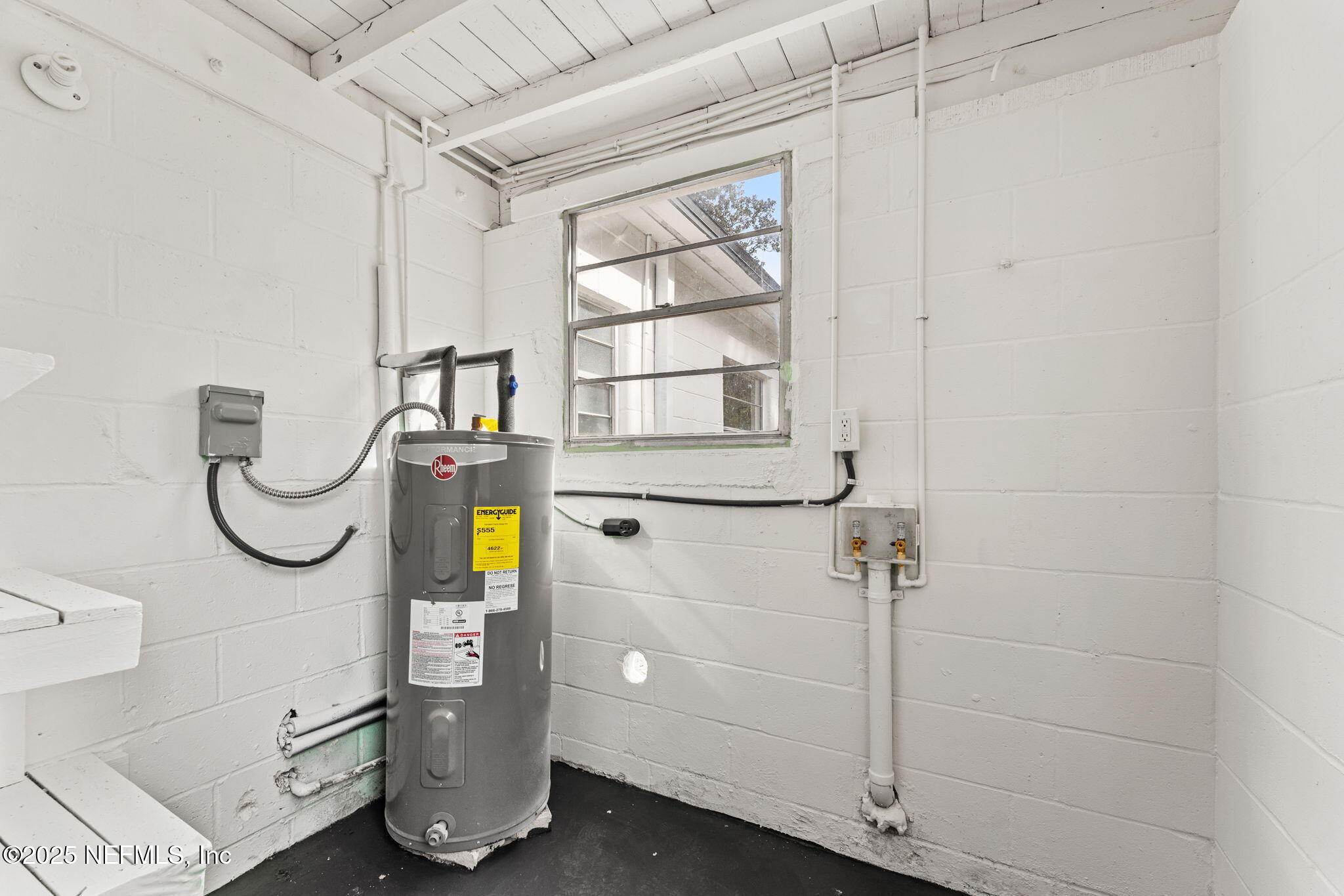 1436 Forest Hills Road Jacksonville, FL 32208 - Photo 23 of 27 a bathroom with a sink and a shower
