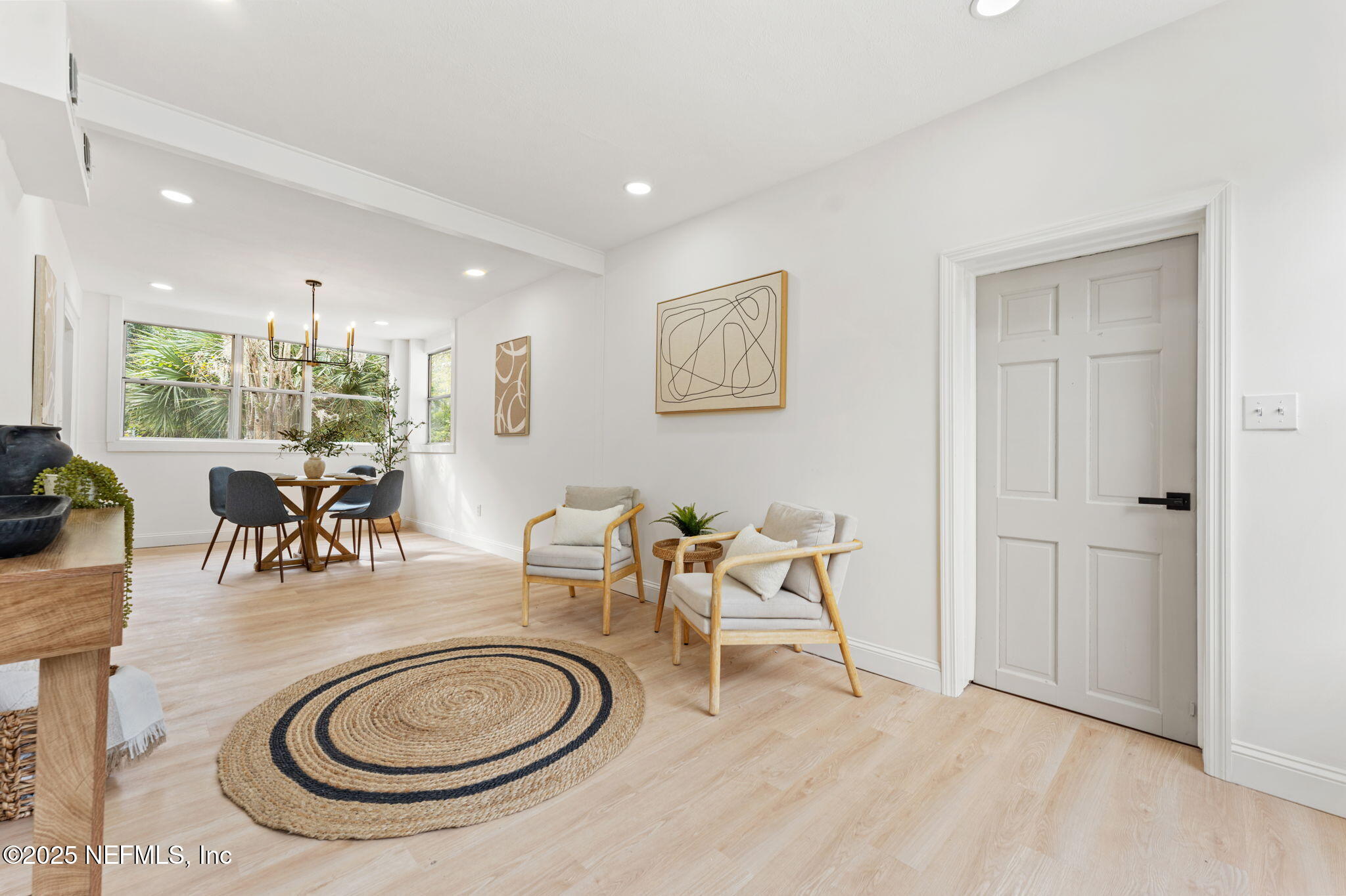 1436 Forest Hills Road Jacksonville, FL 32208 - Photo 3 of 27 a dining room with furniture and wooden floor
