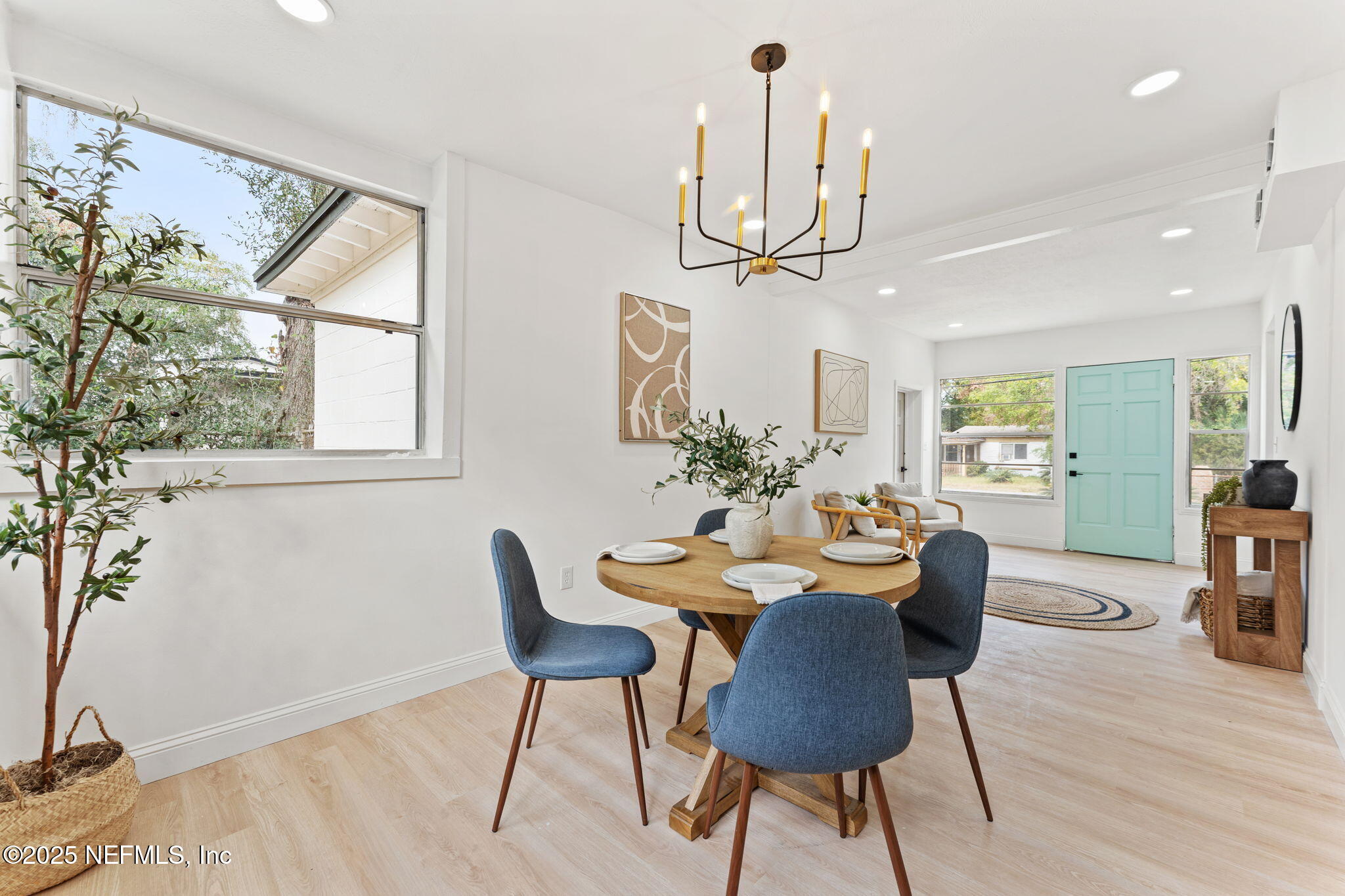 1436 Forest Hills Road Jacksonville, FL 32208 - Photo 6 of 27 a view of a dining room with furniture window and wooden floor